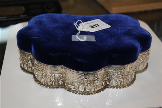 An Edwardian repousse silver mounted shell shaped trinket box, 8.5in.(-)